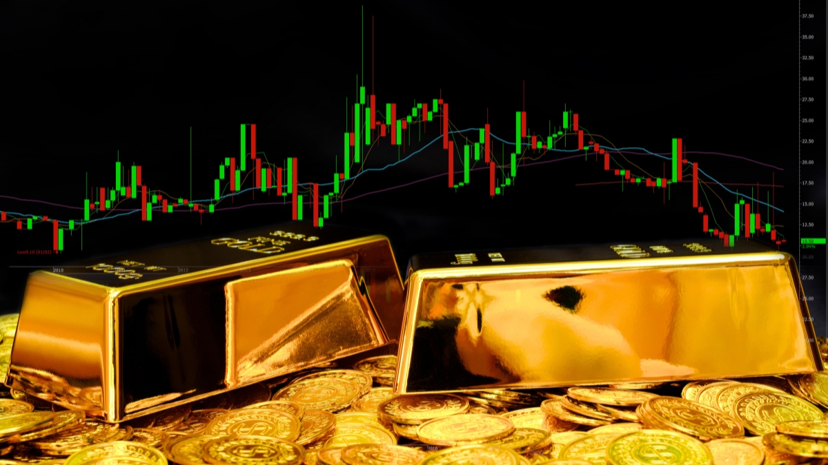 Chart trading dan dua buah emas batangan